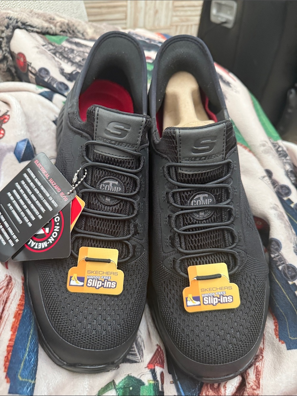 Skechers Men’s Black Slip-On Sneakers with Red Lining